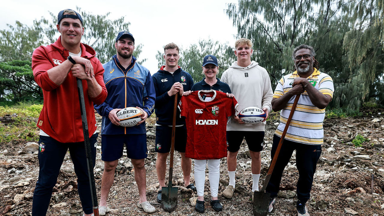 Lions and Wallabies players planting trees on Lady Elliot Island.