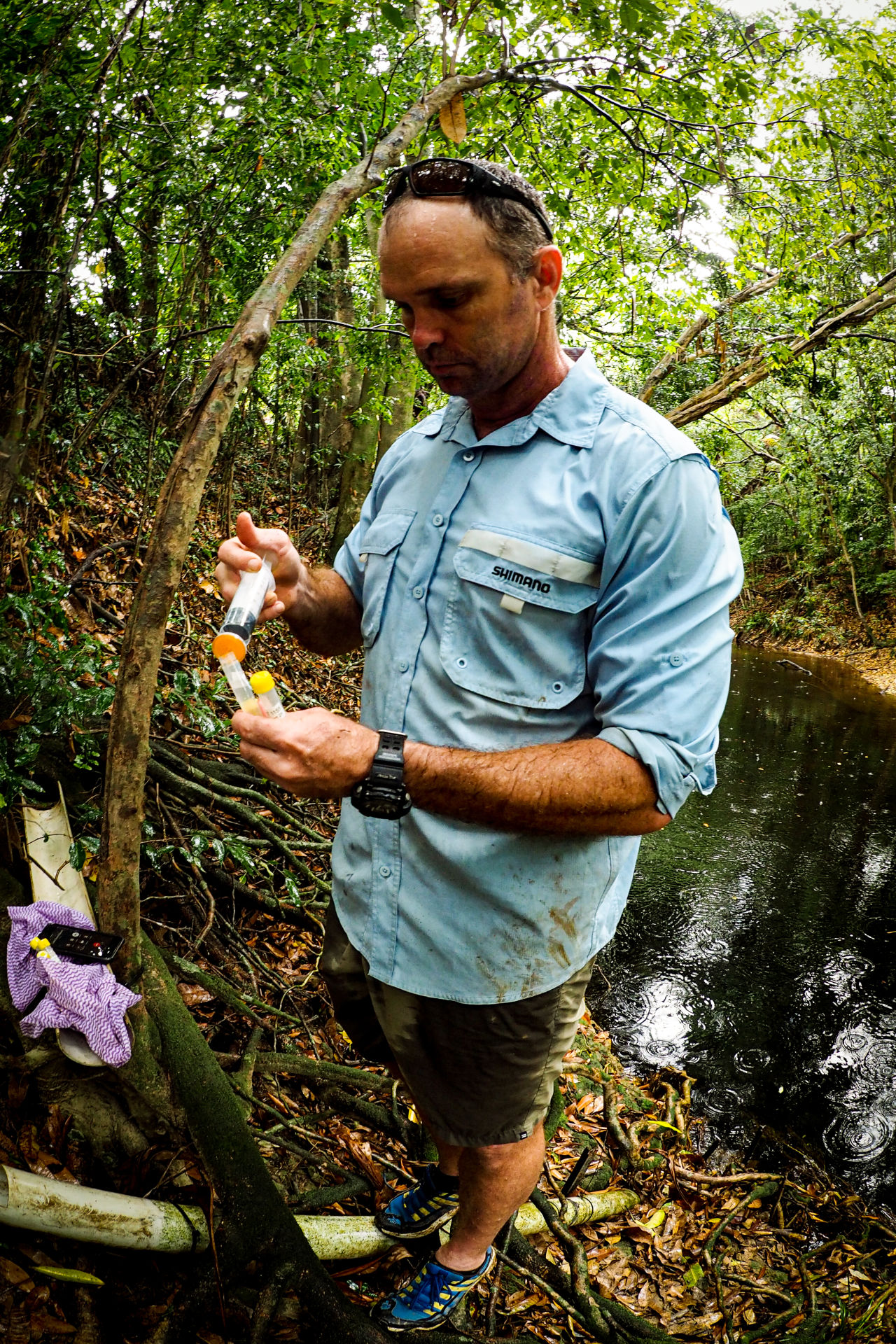 TropWATER Principal Research Scientist Aaron Davis collecting samples. Credit: JCU TropWATER