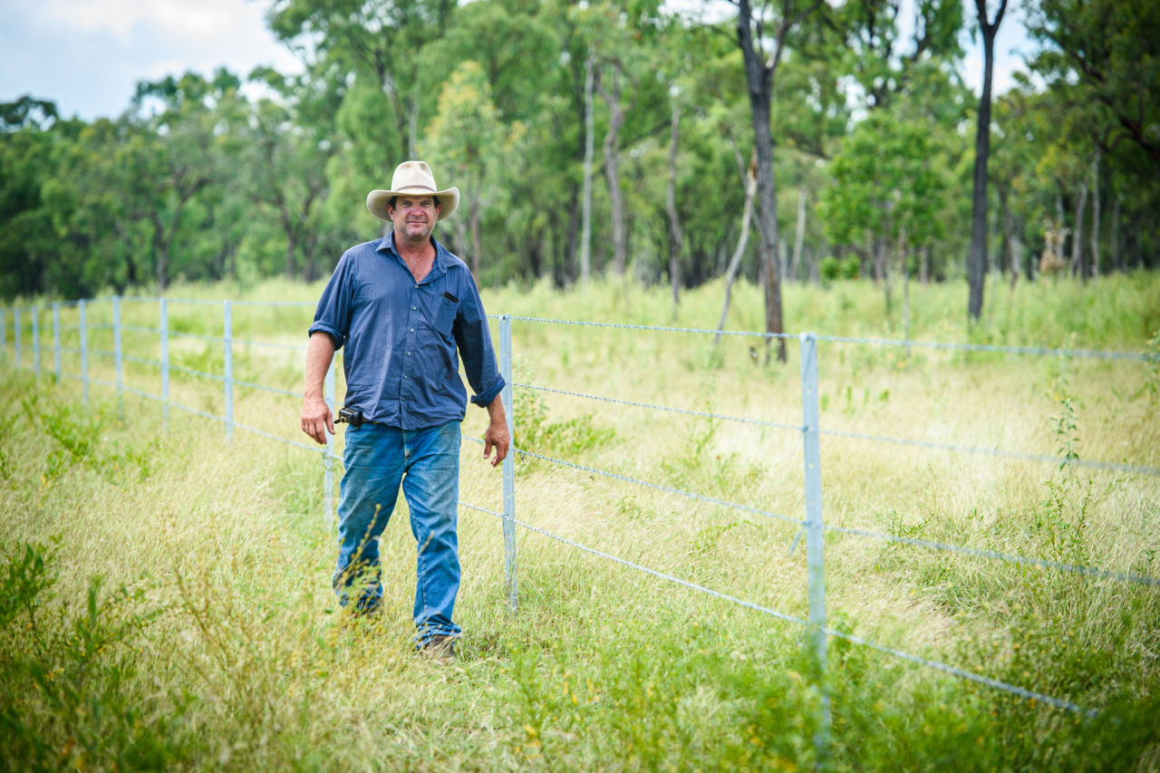 John Skinner, of White Kangaroo checks the fence that split a large paddock into two 12-months ago to better manage grazing pressure.