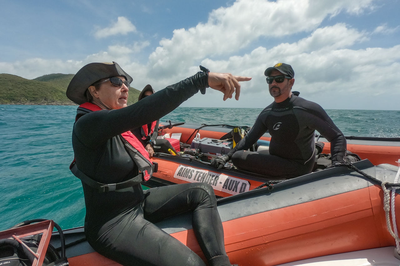 Katharina preparing to dive and monitor a site on the Great Barrier Reef, with the Reef Restoration and Adaptation Program team. Credit: Ian McLeod, AIMS