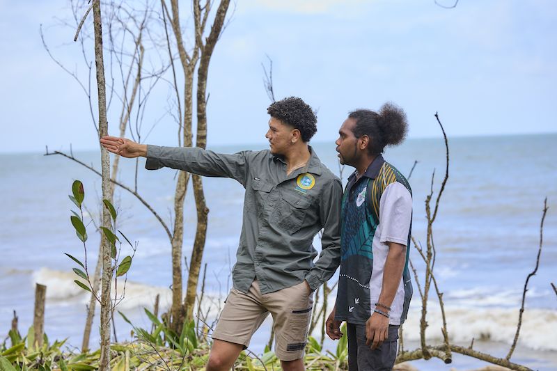 Goondoi Ranger and Strong Peoples-Strong Country Community Research Assistant Ki-Shaun Fejo and Ranger Magnus Edwards inspect the beach at Flying Fish Point. Credit: Our Reef Stories