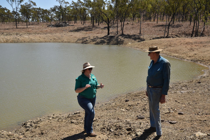 Grazing Field Officer Ashleigh Kilgannon discussing the impacts of the installation of a new dam on grazing pressure throughout the paddock. Credit: NQ Dry Tropics)