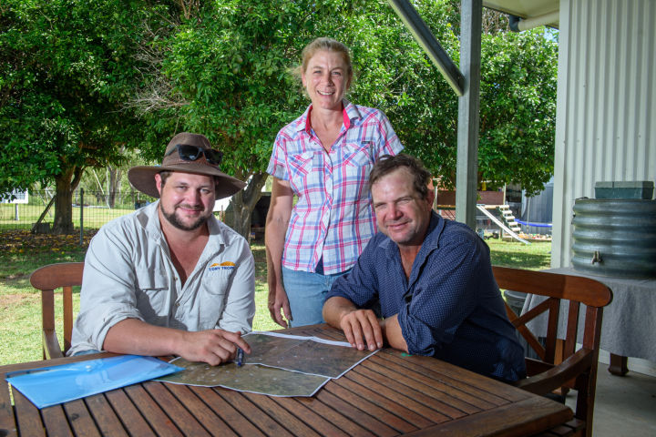 NQ Dry Tropics Grazing Field Officer Brad Martin with Bree and John Skinner of White Kangaroo Station. Credit: NQ Dry Tropics