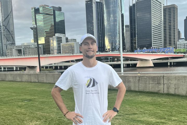 Tom runs first marathon for the Reef 